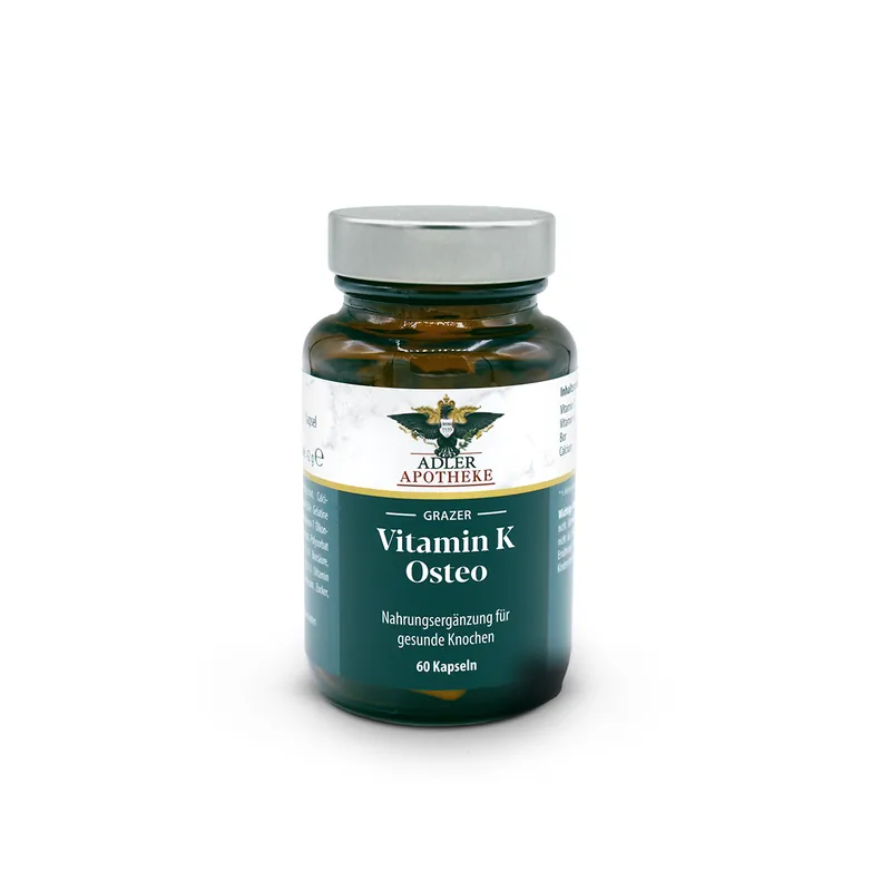 Braune Glasflasche mit silbernem Schraubdeckel und blau-weißem Etikett „Grazer Vitamin K Osteo Kapseln“; Packung mit 60 Kapseln.